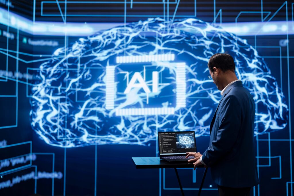 Programmer running AI cognitive computing tech on laptop